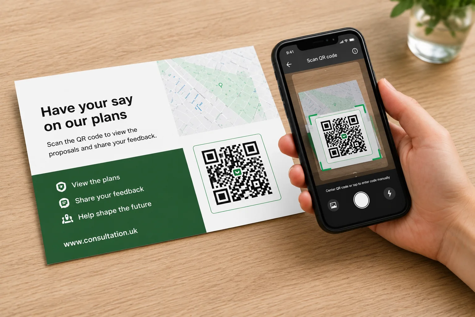 Hand scanning a QR code on a Letterbox leaflet with phone showing the linked consultation page